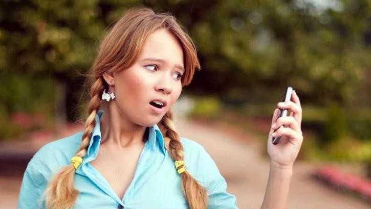 Teen Girl Shocked at Phone
