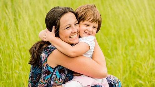 Mom and Kid Hugging Each Other