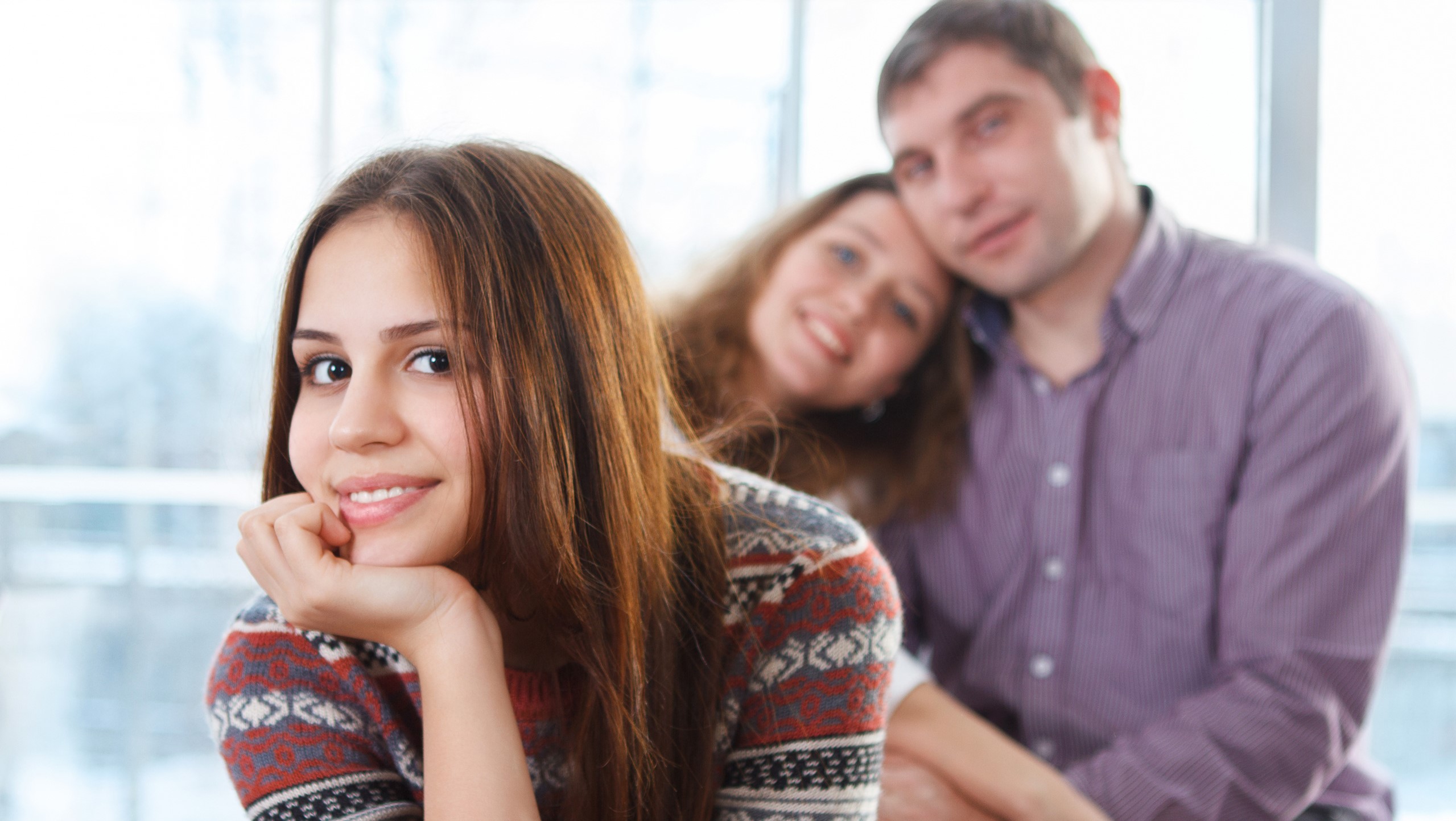 Tween with Her Parents